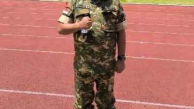 H. Sahril Elmi mengenakan seragam loreng TNI berdiri tegak di lintasan lari Akademi Militer Magelang untuk kegiatan KPPD.