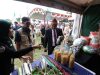 Pejabat daerah meninjau produk UMKM binaan di booth pameran PT Semen Baturaja pada perayaan HUT OKU ke-116.